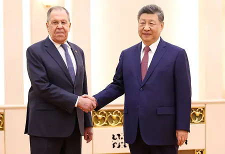 China’s Xi meets Russian FM Lavrov